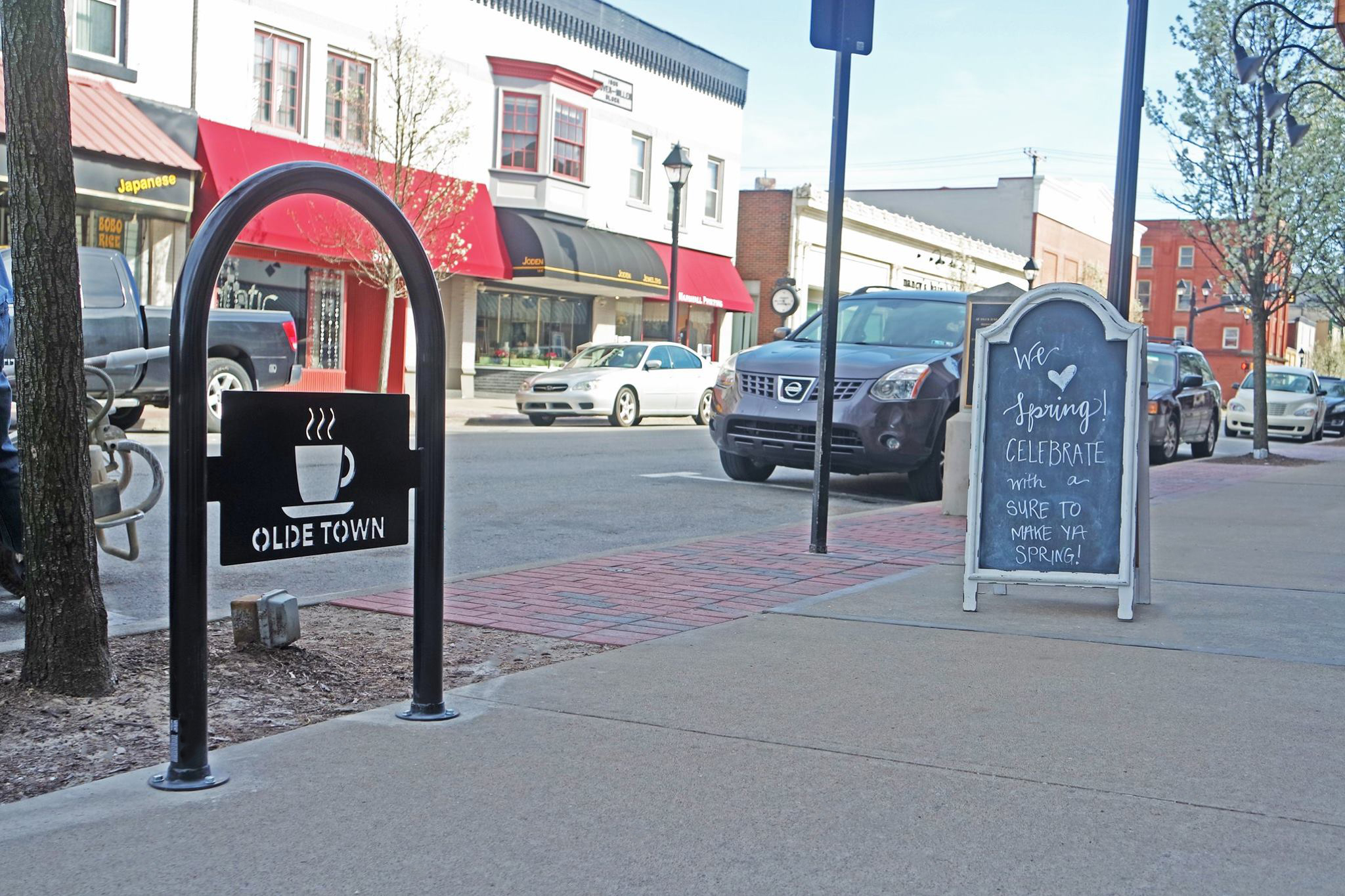 Sonance 1Loop Bike Rack Lasercut Logo Streetscape