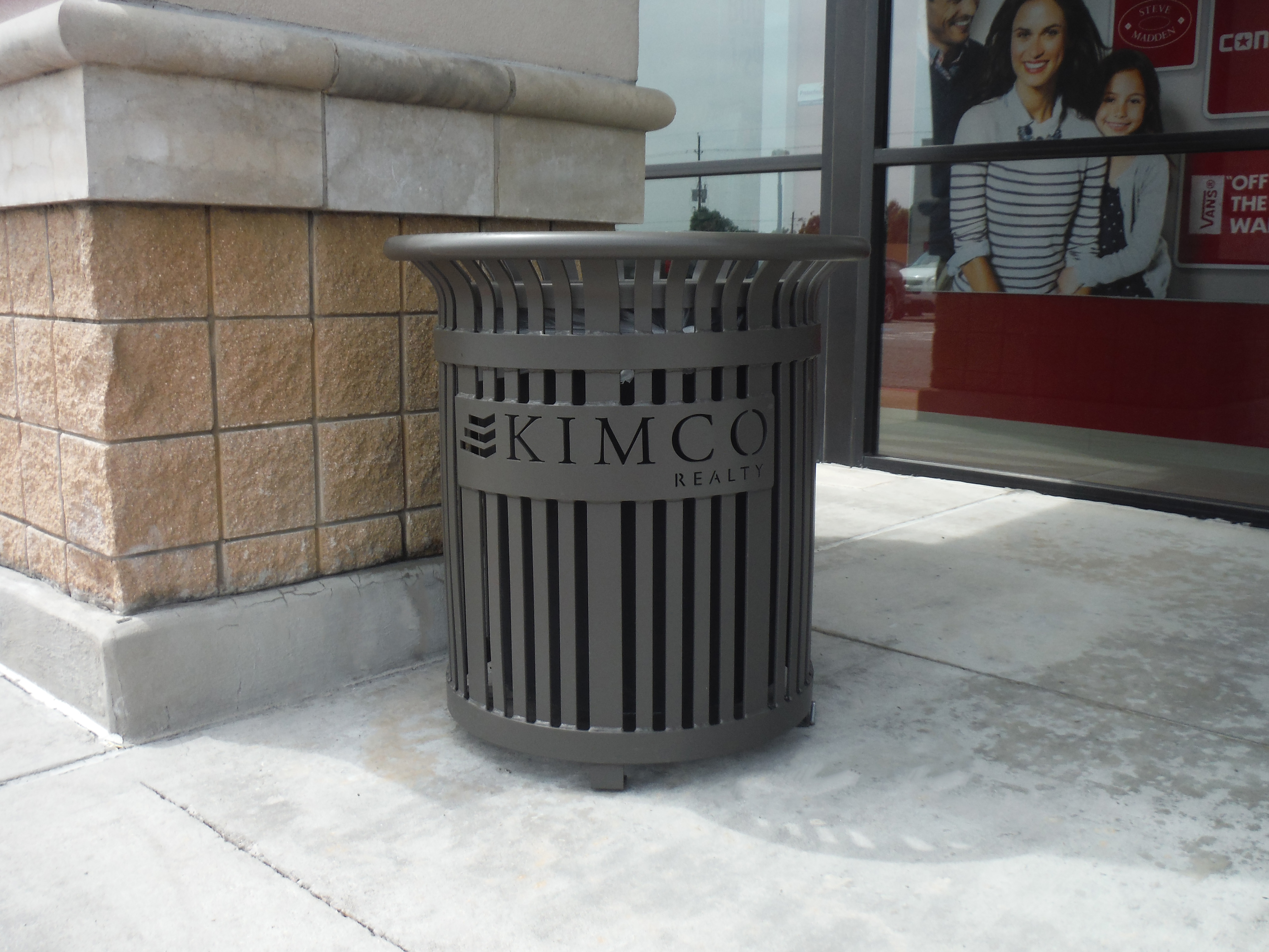 Midtown Litter Receptacle 32Gal Lasercut Bronze Retail TX
