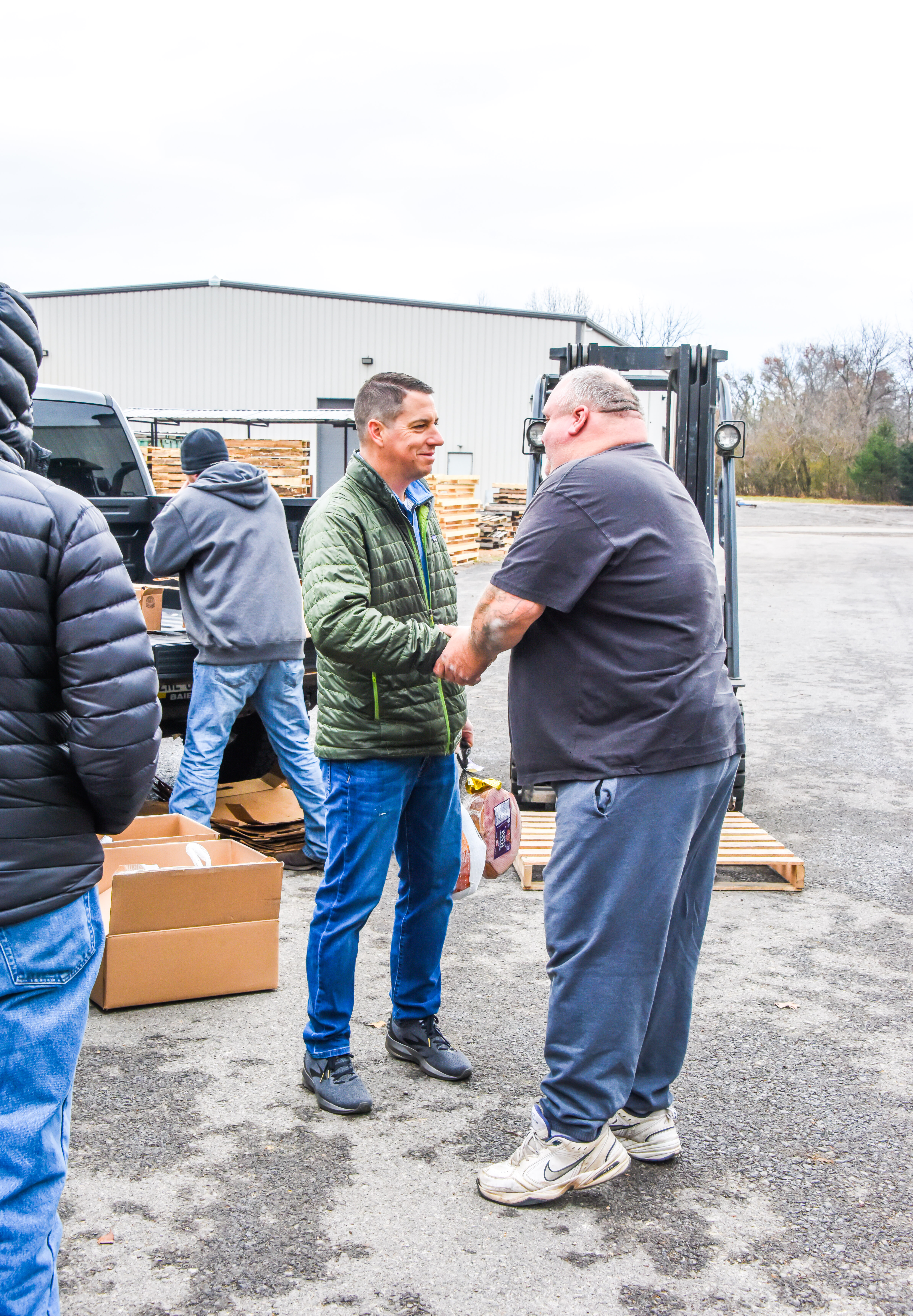 Employees Hand Shake Outdoors