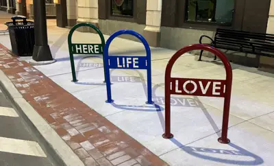 Sonance 1Loop Bike Rack Lasercut Words Streetscape