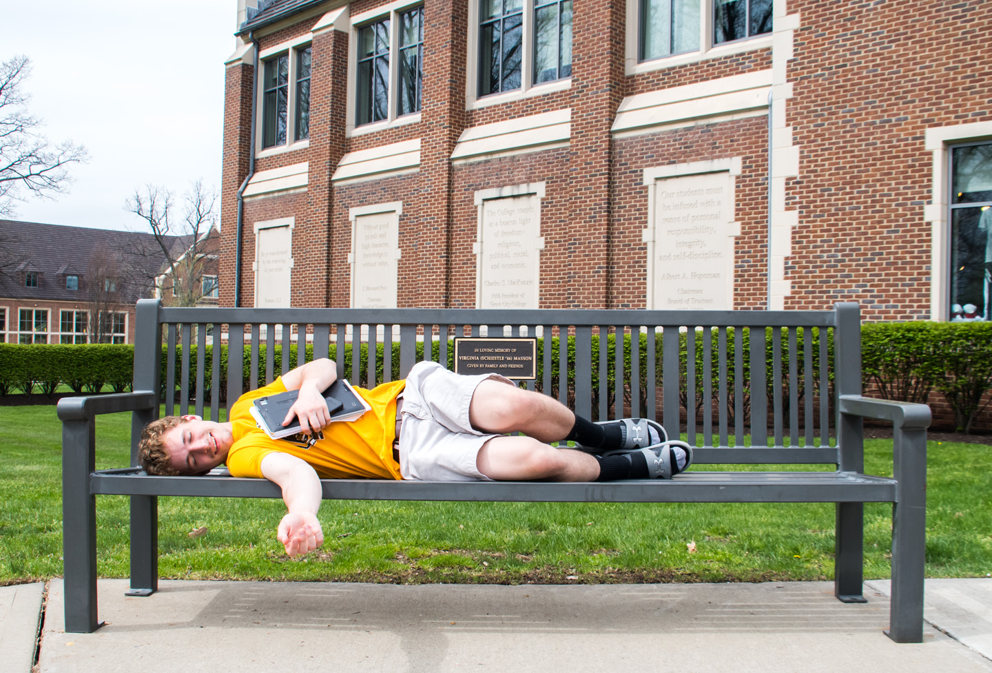 reading-bench-with-back-student-on-campus-13.jpg