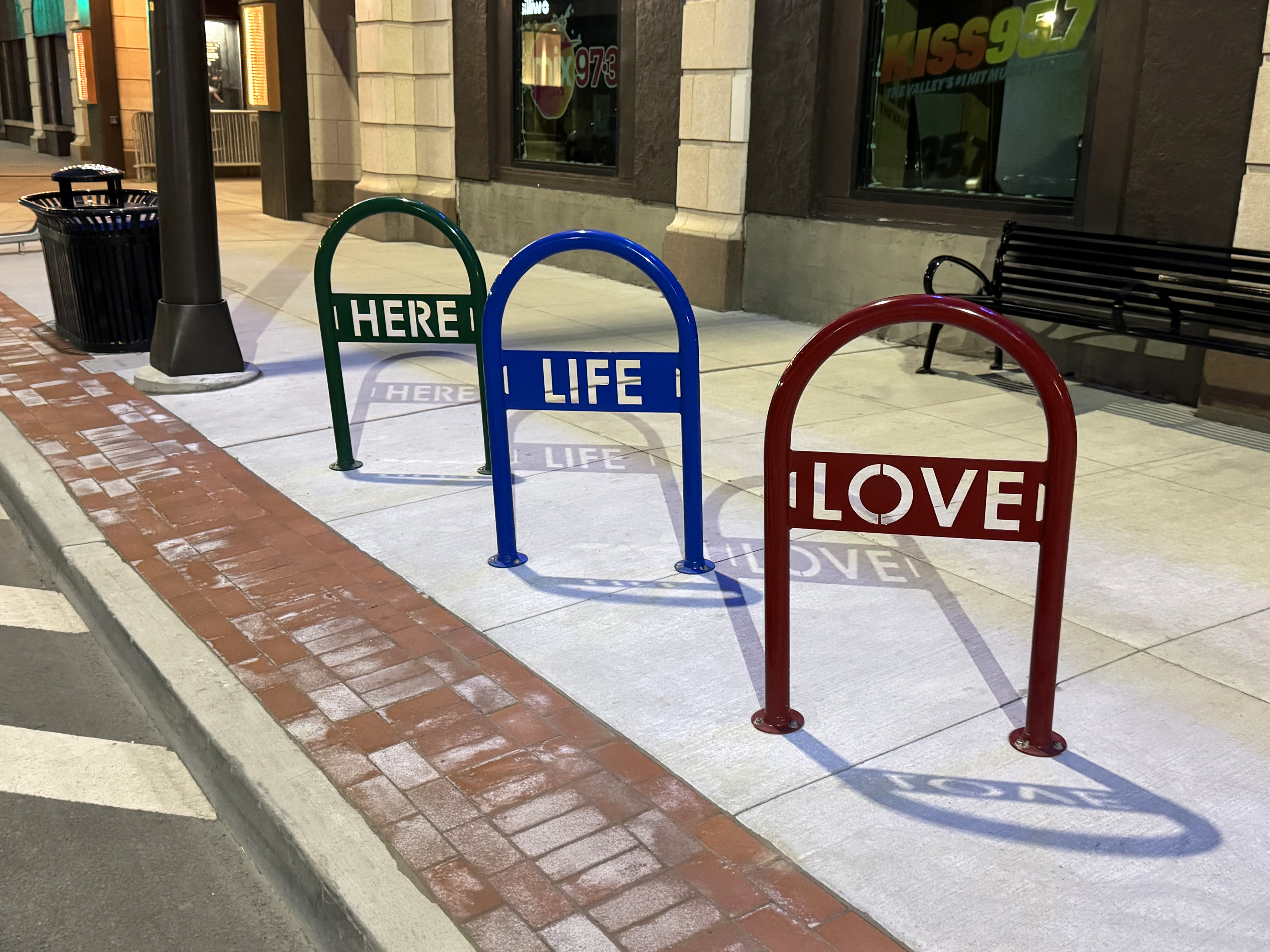 Sonance 1Loop Bike Rack Lasercut Words Streetscape